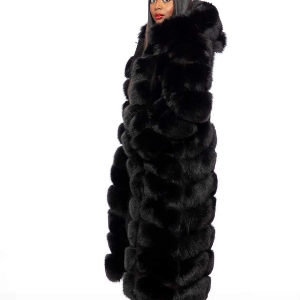 Black faux fur hooded (sleeveless) coat.  Heavy!